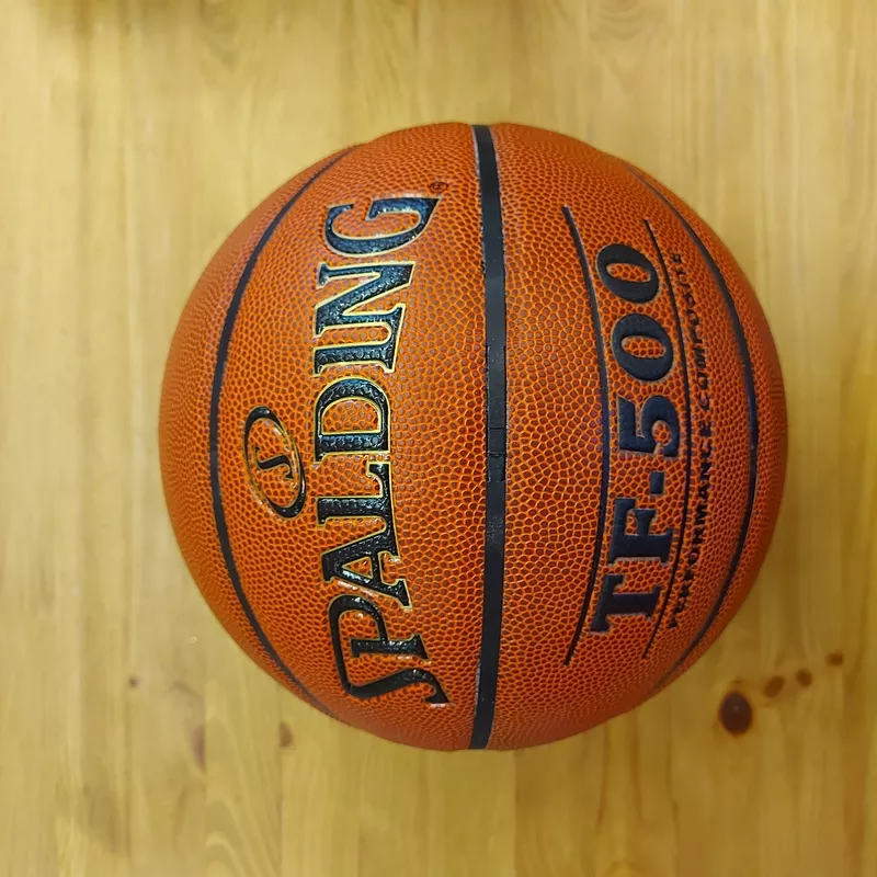 Баскетбольный мяч Spalding. Размер 7. Для зала и улицы. Коричневый. 3